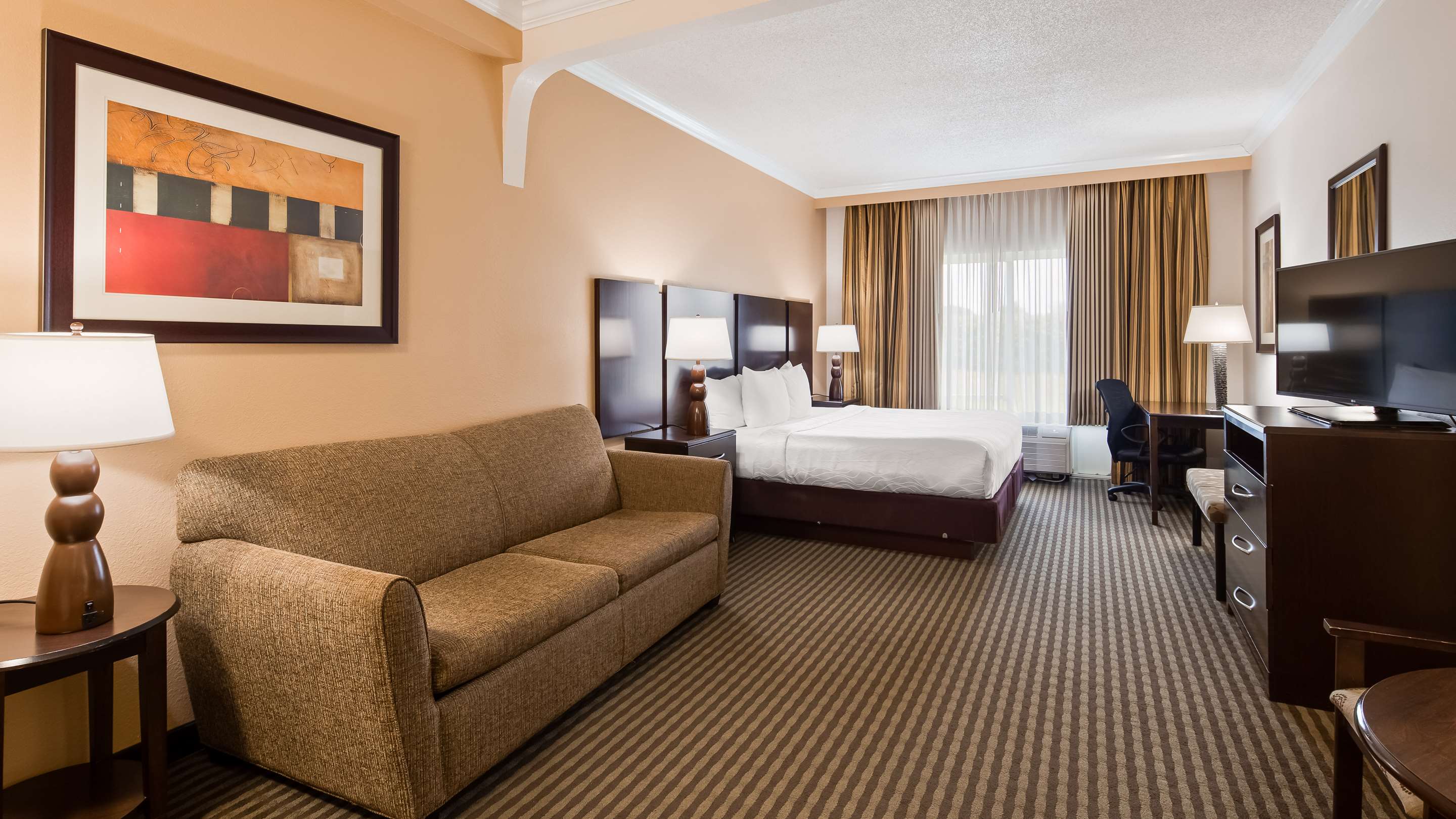 Best Western Plus Ambassador Suites Venice - Tap to explore photos