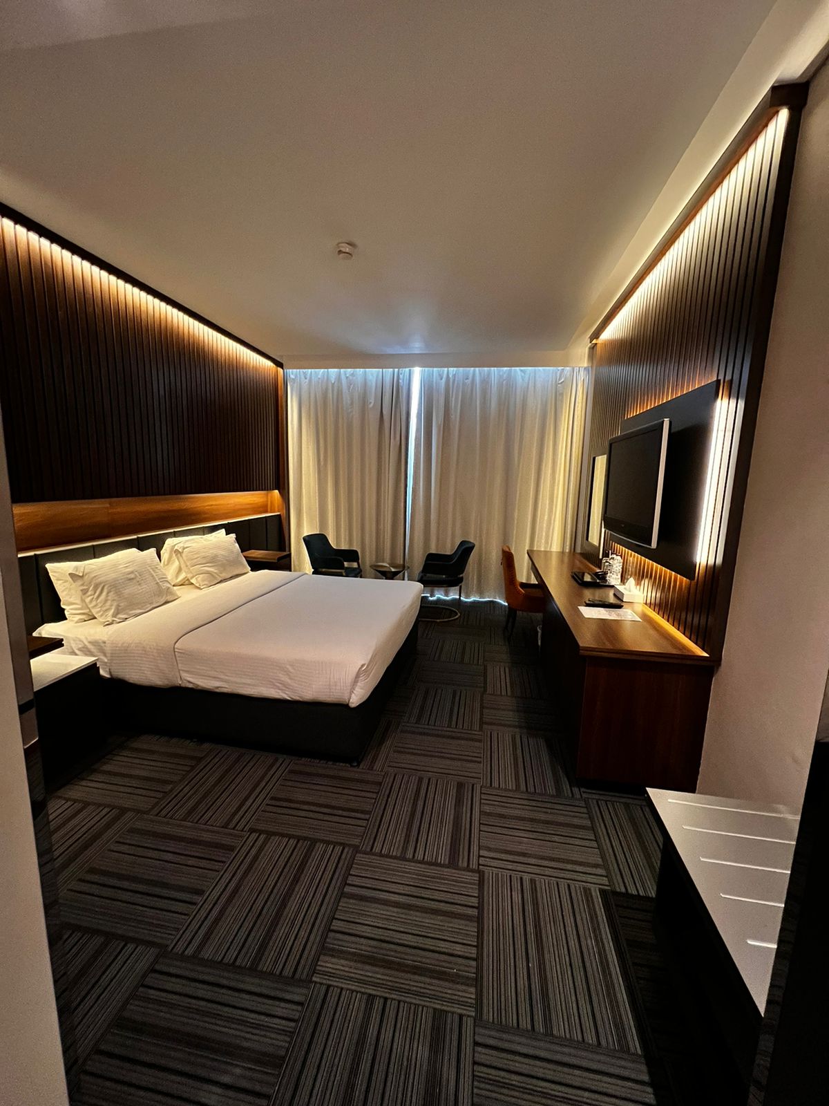 Raha Grand Hotel - Tap to explore photos