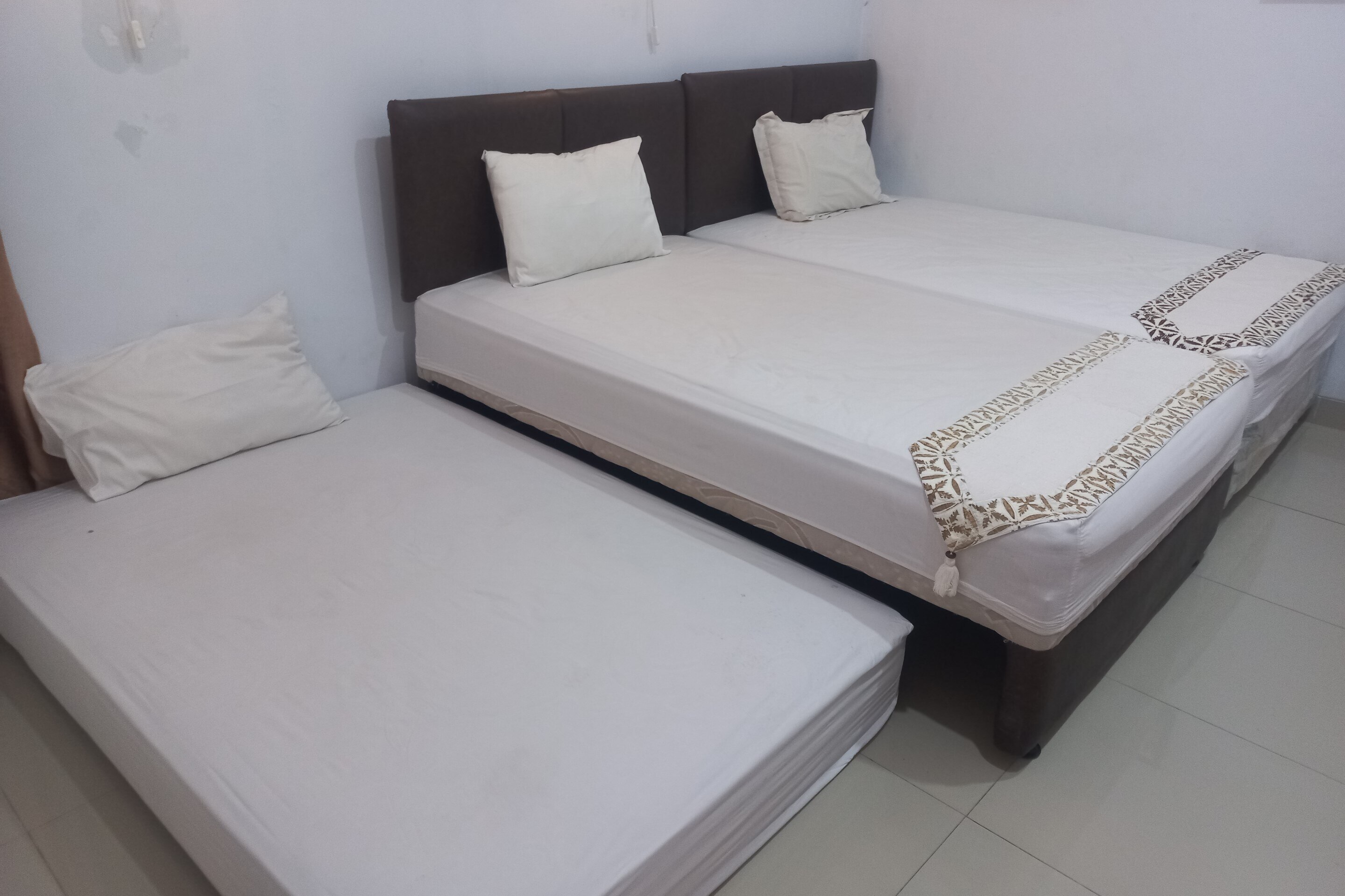 Capital O 93872 Natura Guest House Syariah - Tap to explore photos
