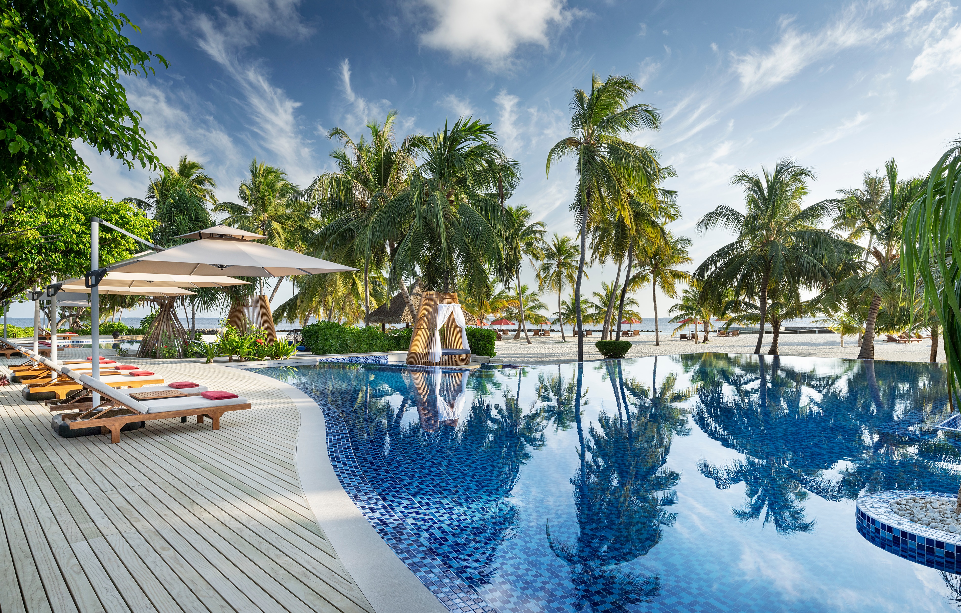 Dhigali Maldives - A Premium All-Inclusive Resort - Tap to explore photos
