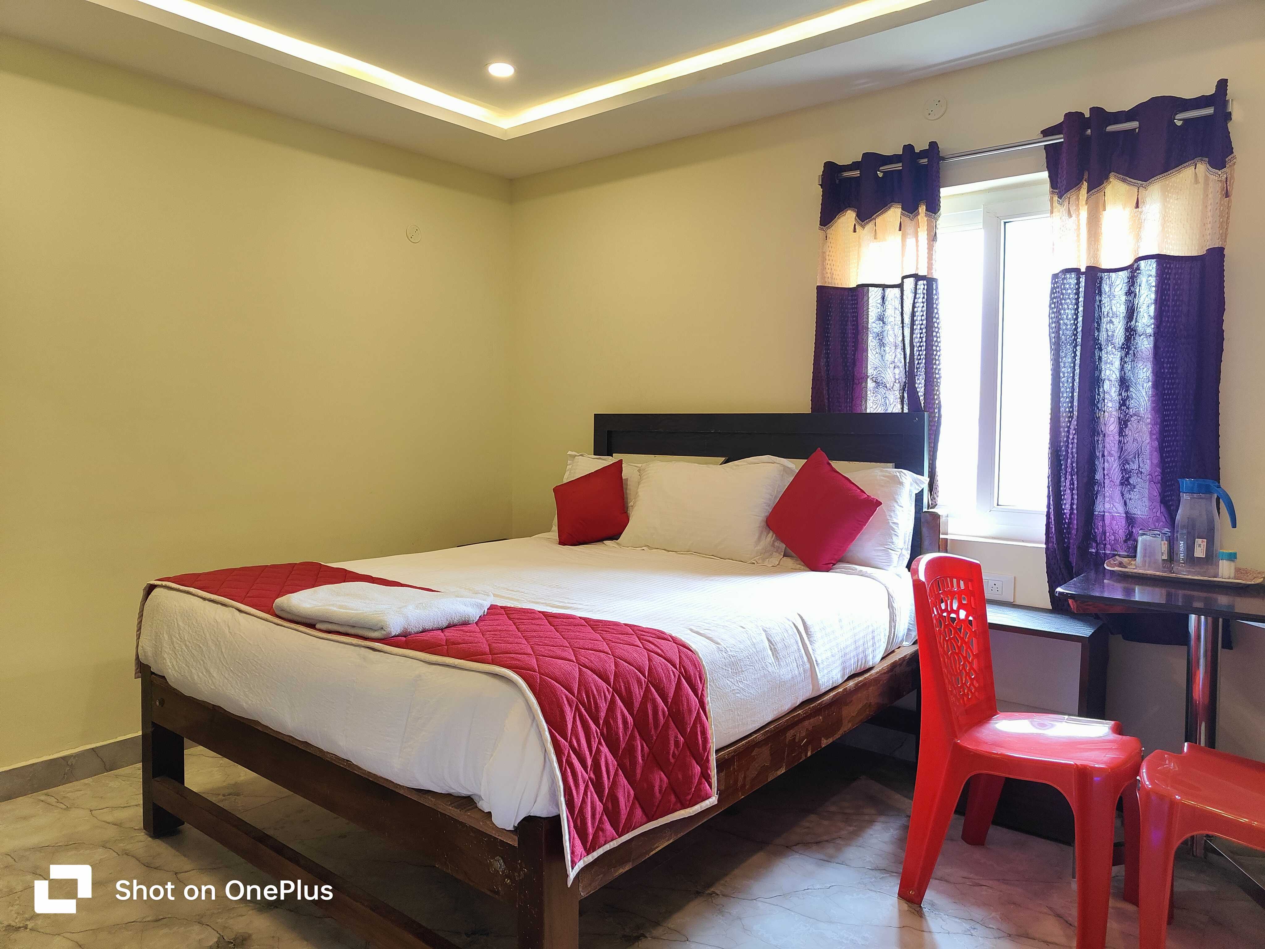 Hotel O SLR Homes - Tap to explore photos