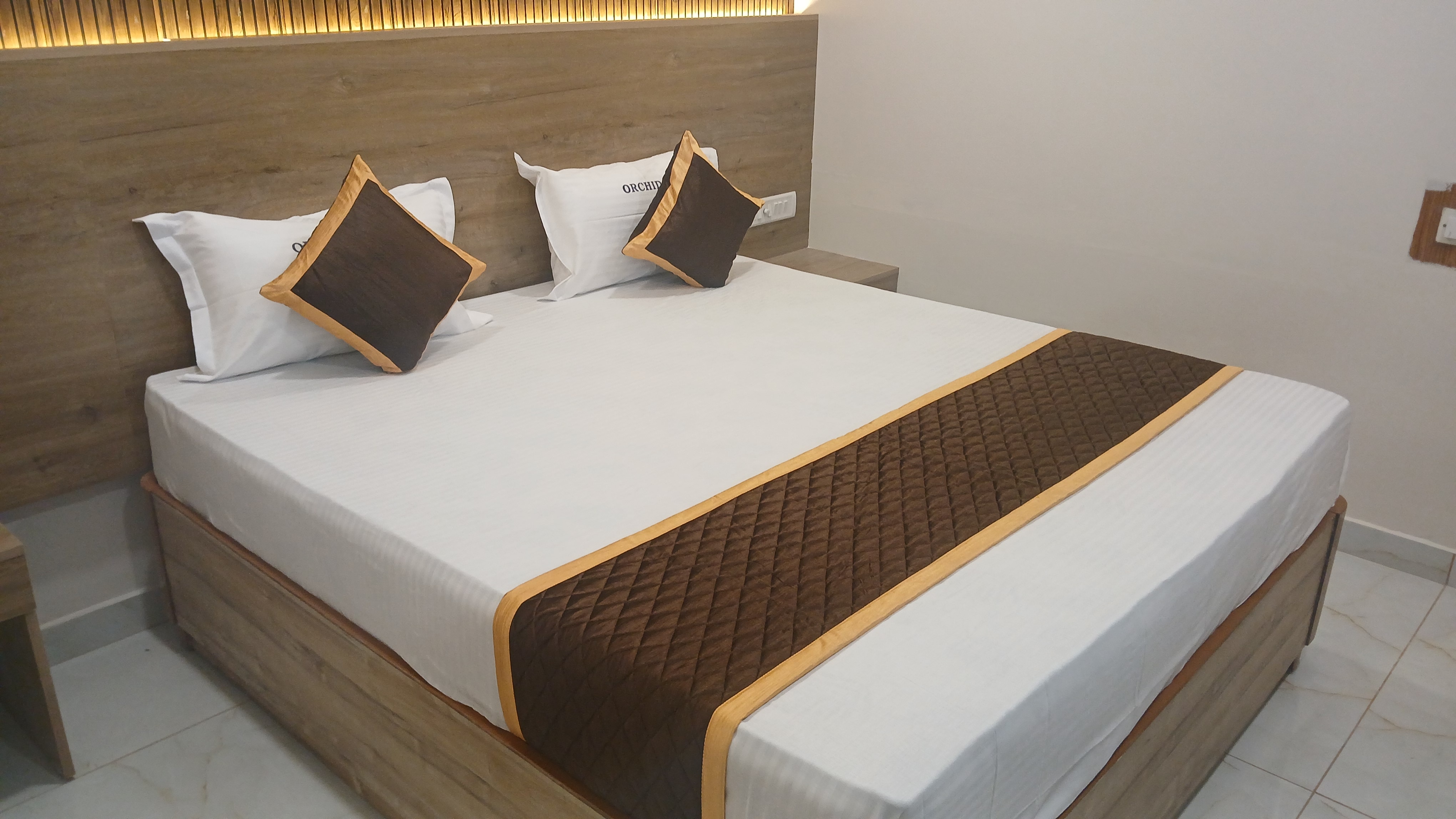 Hotel Orchid Inns - Tap to explore photos