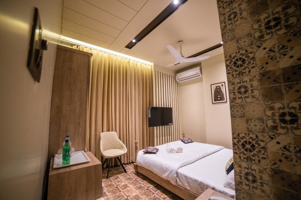  SOGNO Rooms - Tap to explore photos