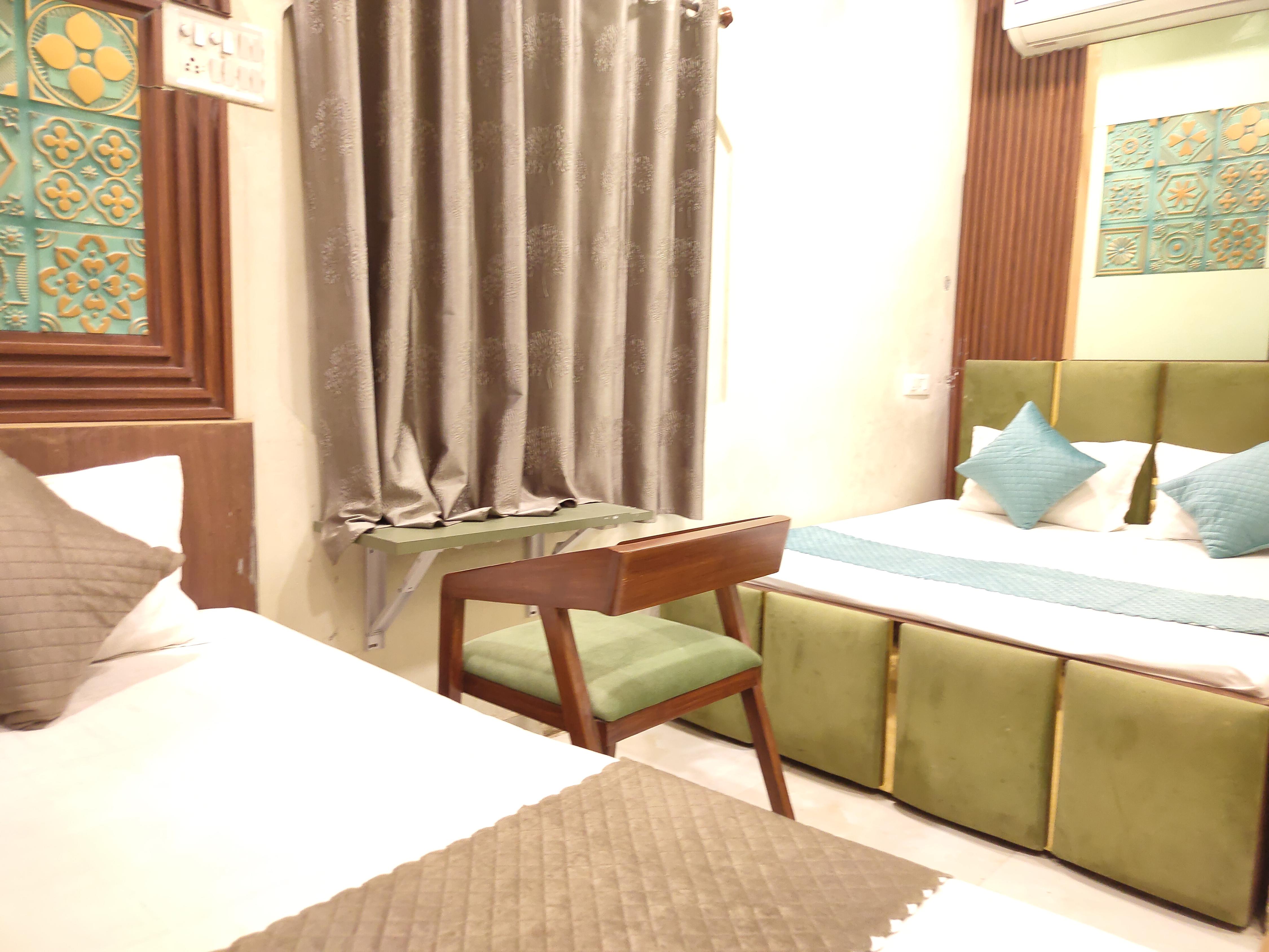 Three bedded Ac Room with attached washroom. 1