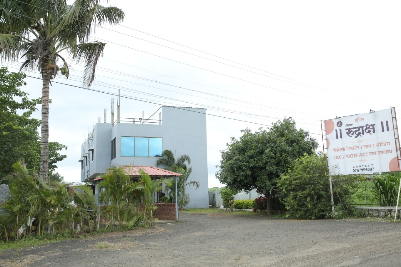 Hotel New Rudraksh - Tap to explore photos