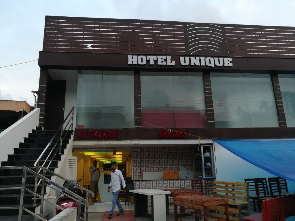 Hotel Unique - Tap to explore photos