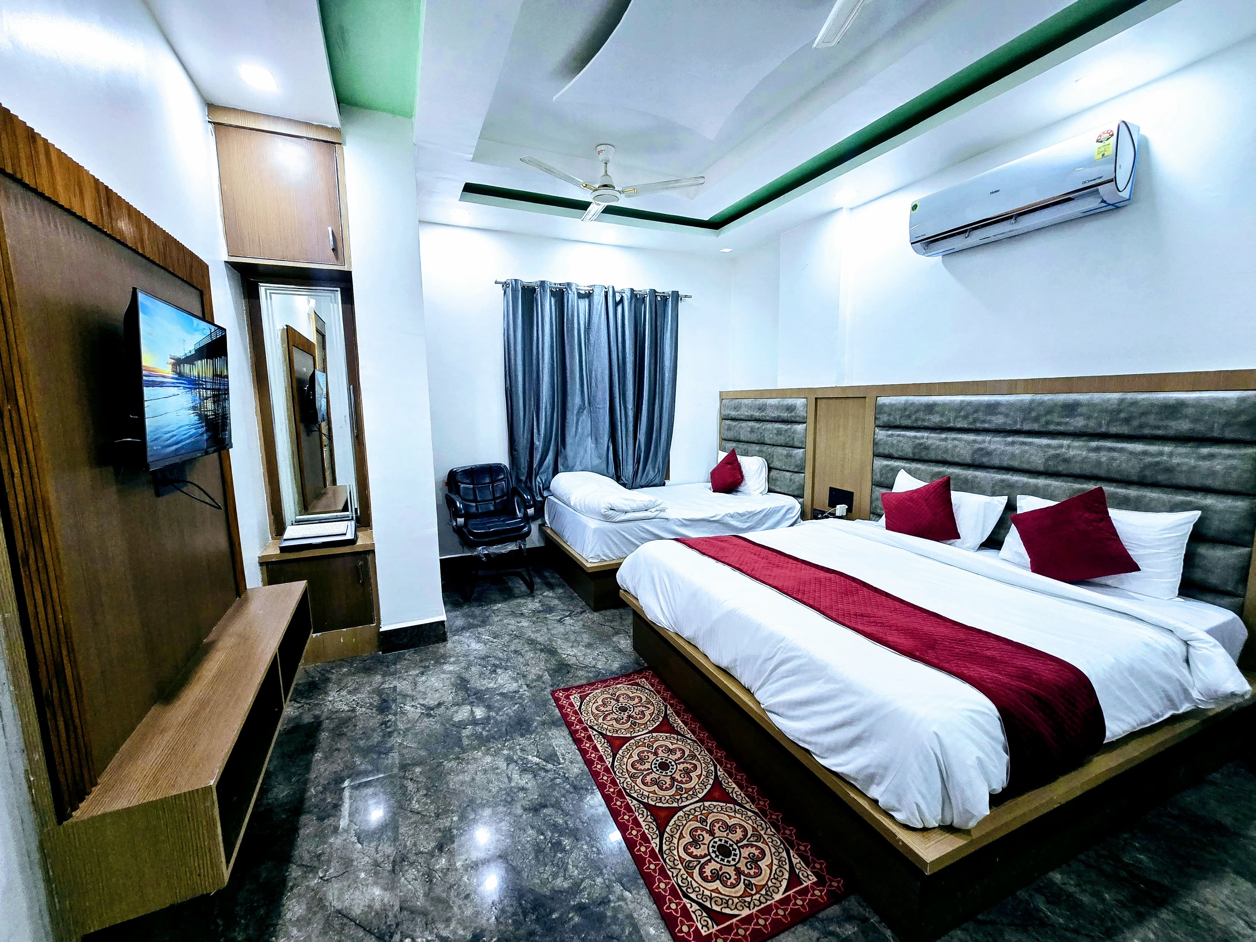 Hotel Aarav Grand - Tap to explore photos