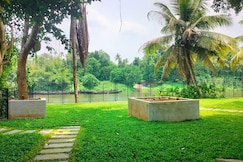 Tranquil villa-2 Bedrooms |Lake view by Homeyhuts, Muvattupuzha