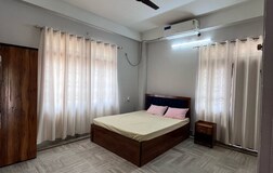 AC Bedroom 2 with a balcony
