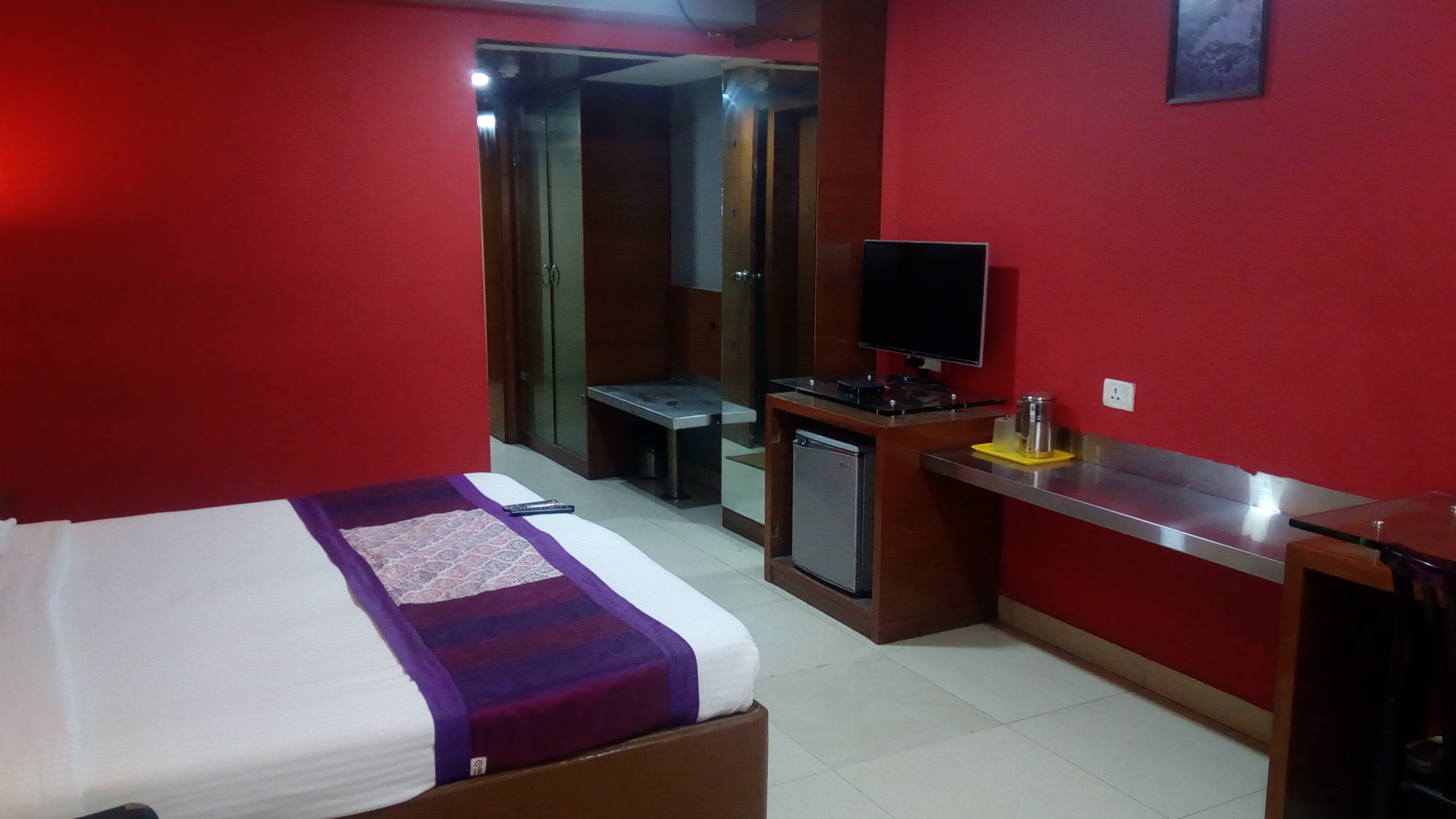 Hotel Arun International - Tap to explore photos