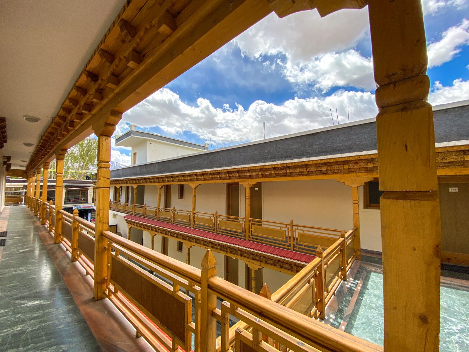 Hotel Dimbir Regency - Tap to explore photos