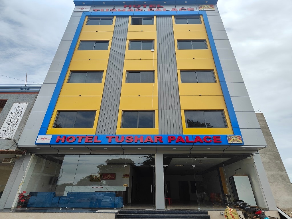 Hotel Tushar Palace - Tap to explore photos