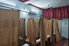 Shyam Shayan Grih | Bed In A Male Dormitory, Raigarh