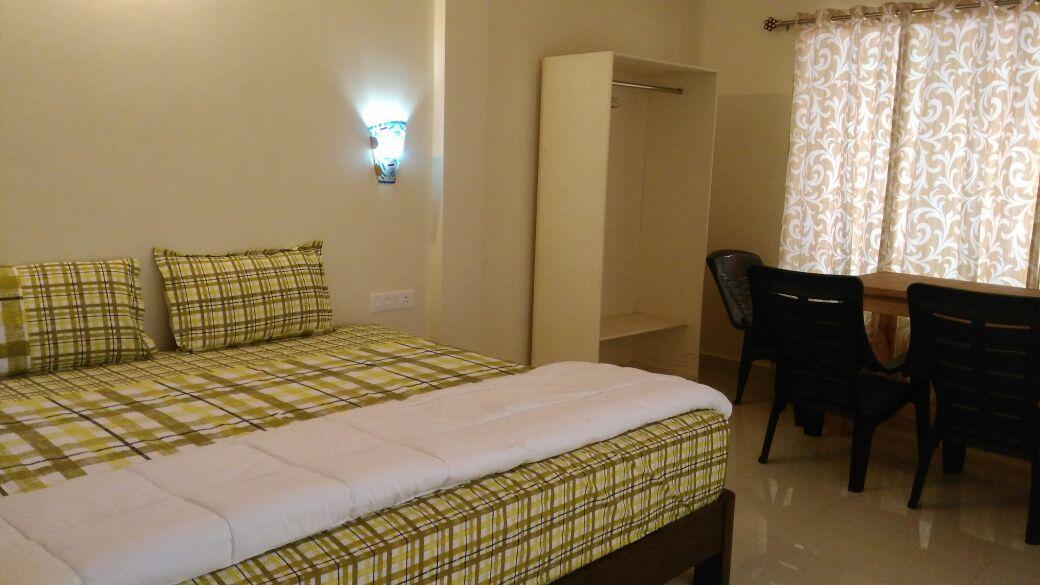 The Nest- Morjim (AC Room) - Tap to explore photos