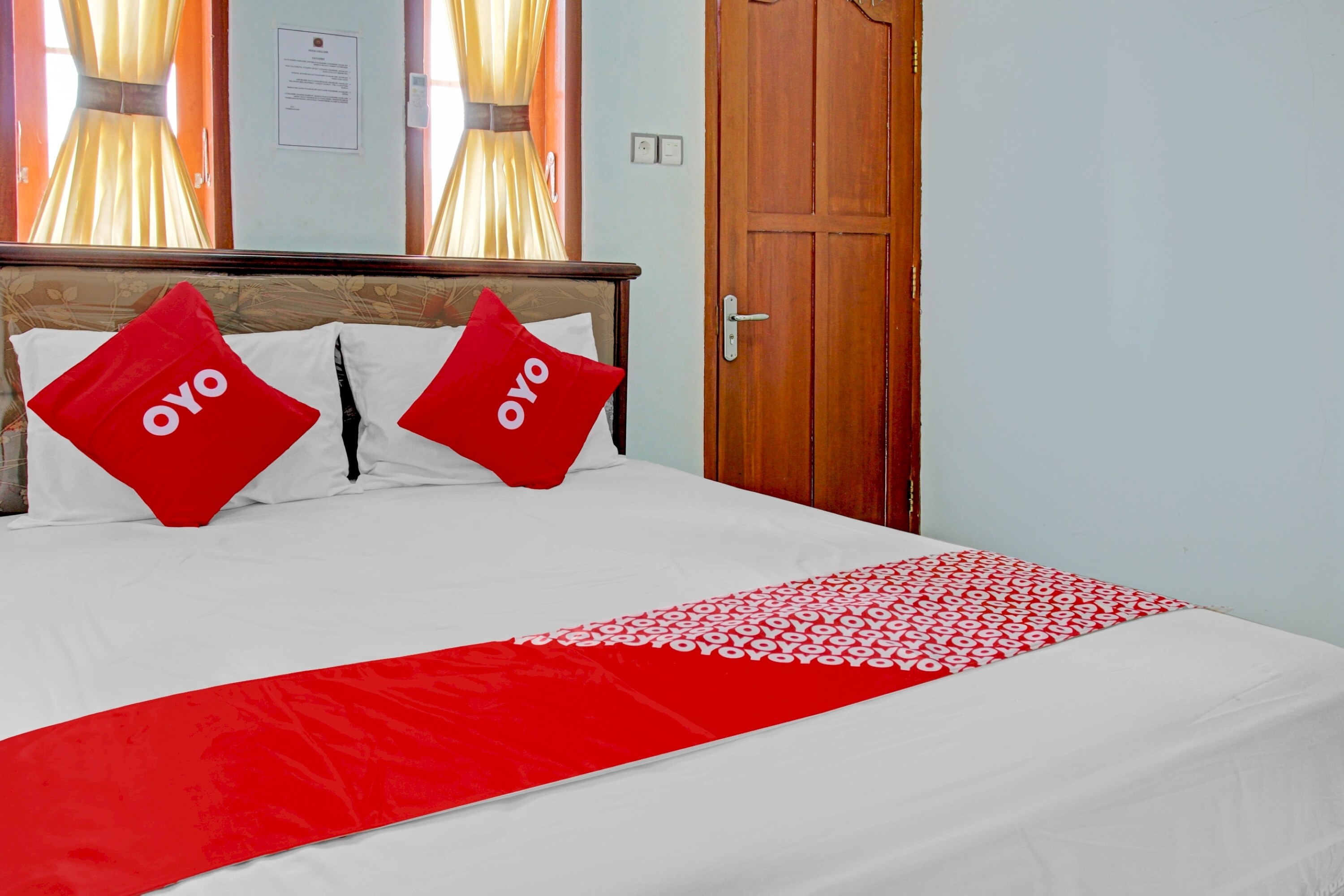 OYO 90029 Bwi Guest House - Tap to explore photos