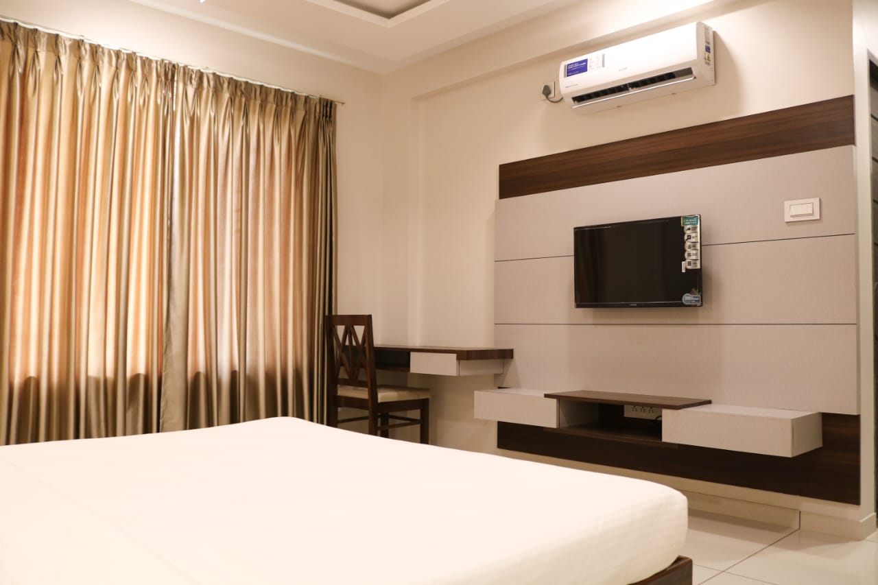 Hotel Grand Indu - Tap to explore photos