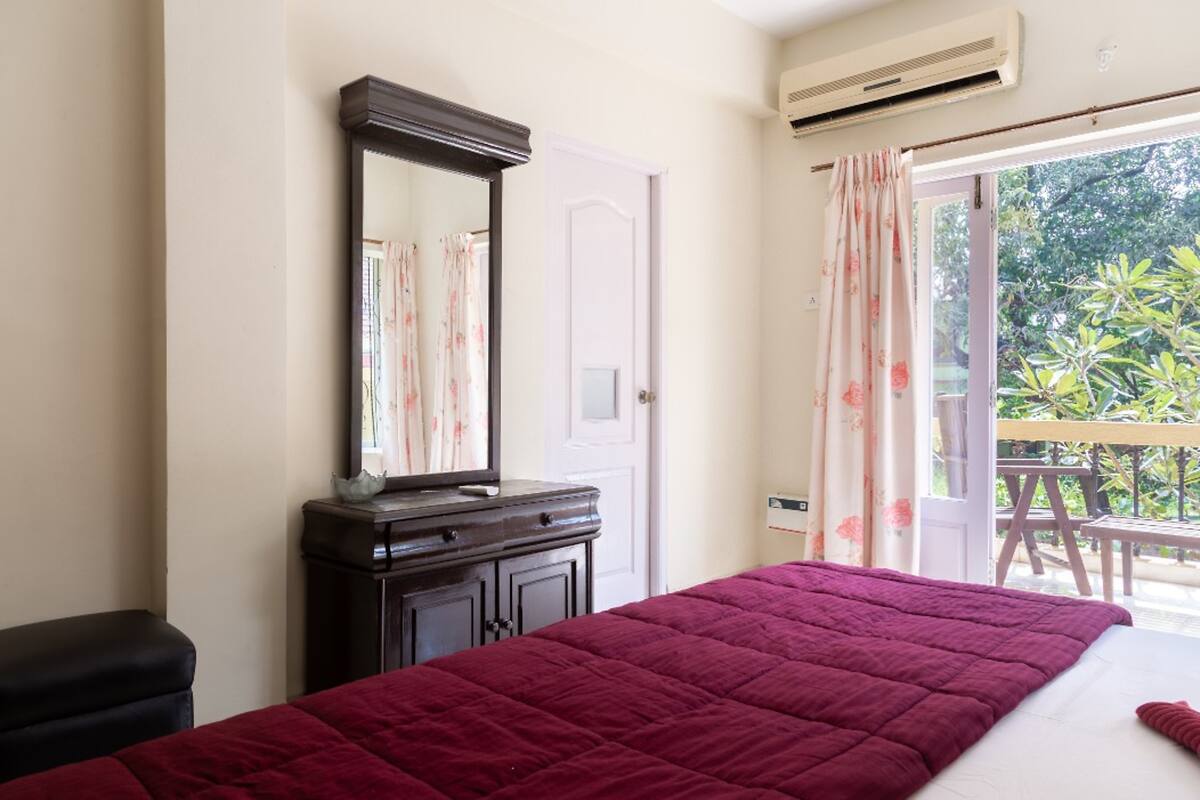Dona Karen | 2 BHK Pool-facing Apartment - Tap to explore photos