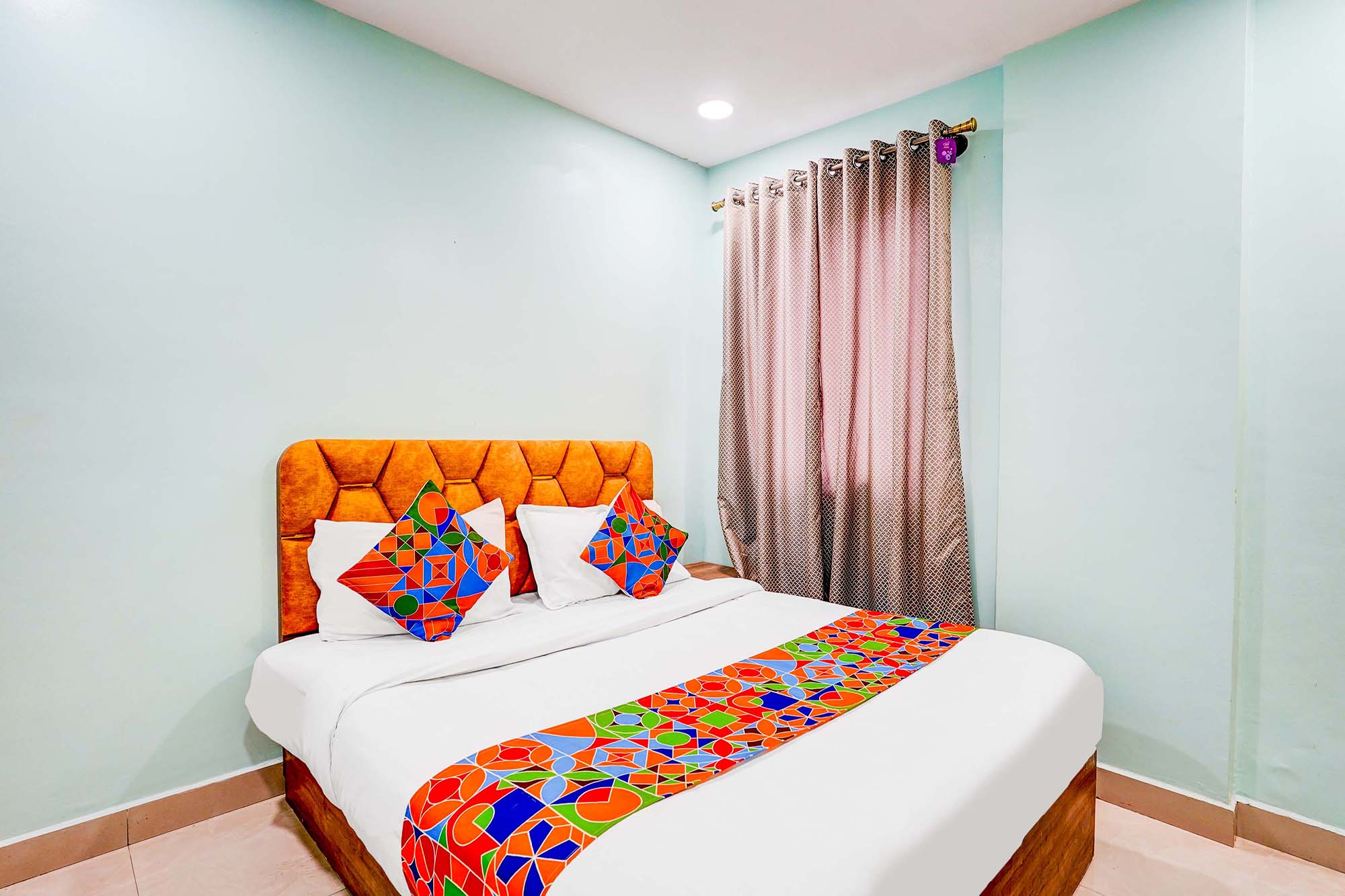 FabHotel Emara Inn - Tap to explore photos