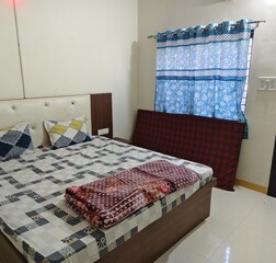 Bedroom 1 with jumbo cooler fan