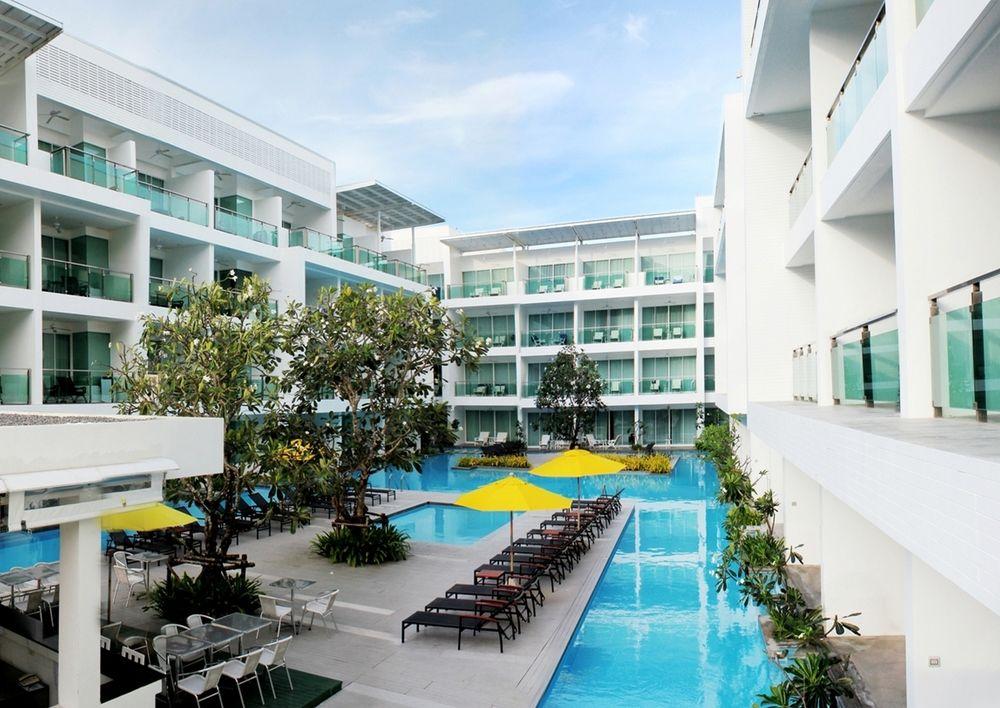 The Old Phuket Karon Beach Resort - Tap to explore photos