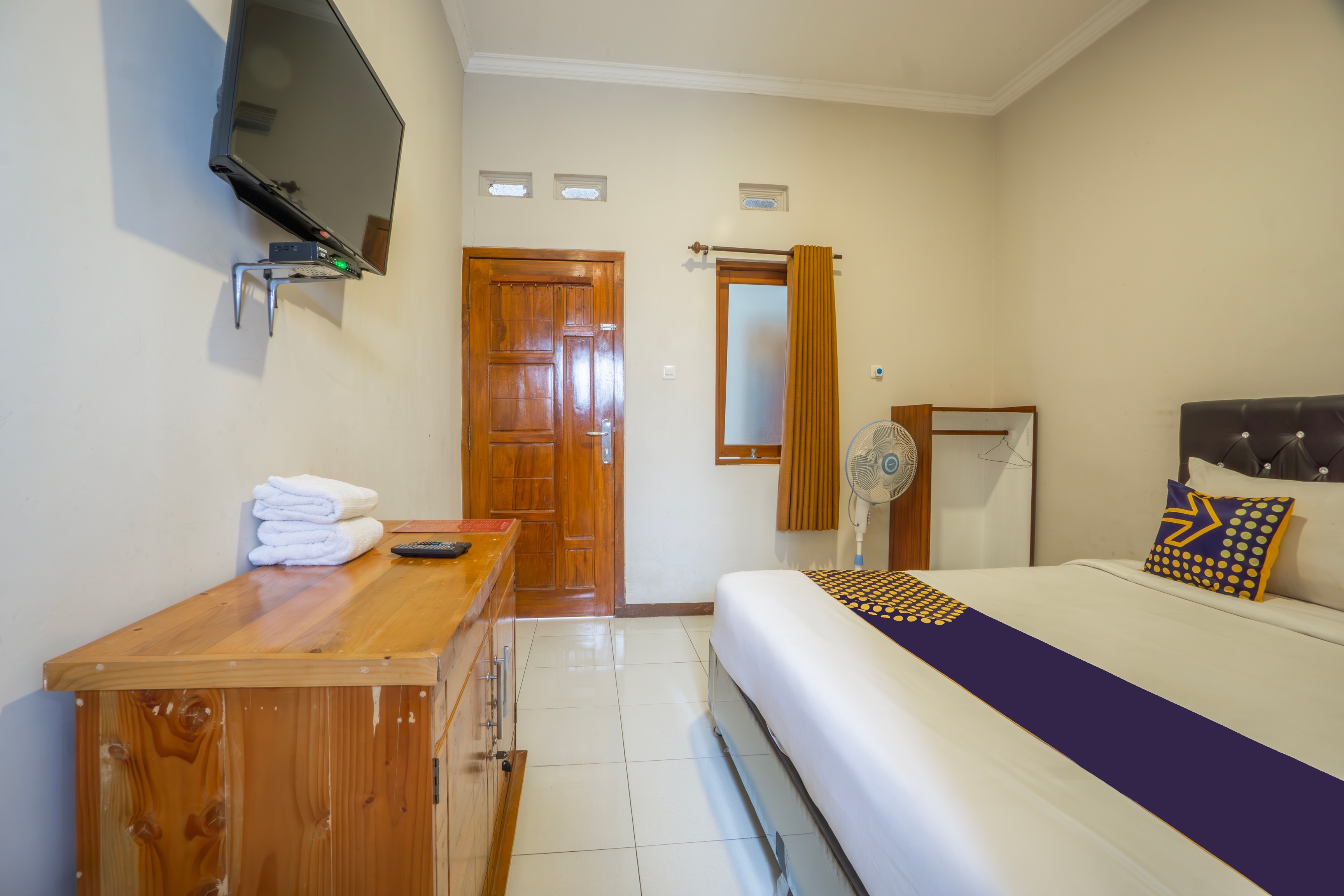 SPOT ON 93754 Buduran Homestay Syariah - Tap to explore photos