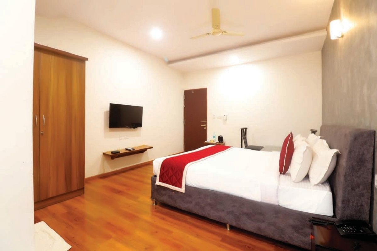 Dhanvitha Suites - Tap to explore photos