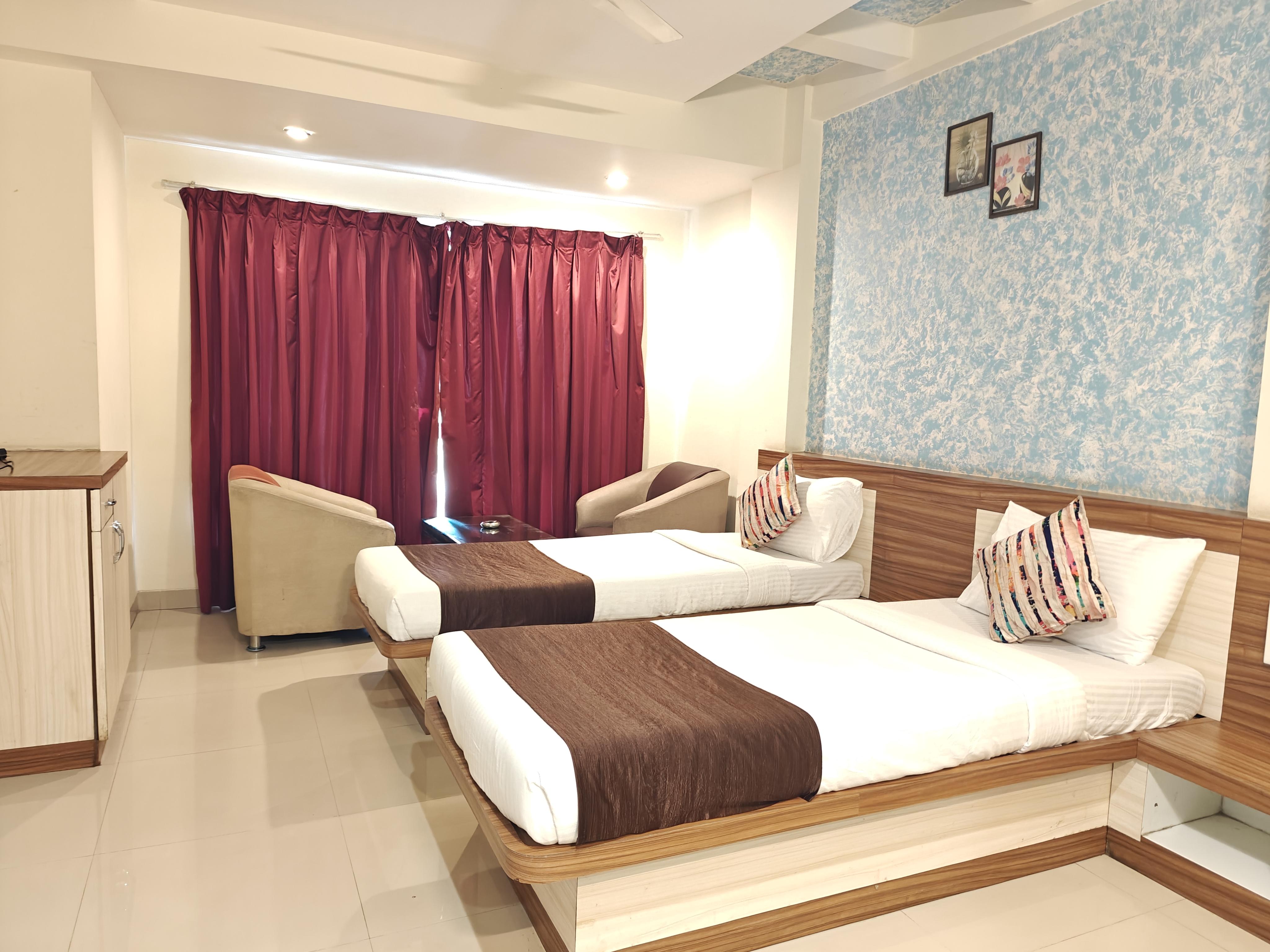 Hotel Amruta Garden - Tap to explore photos