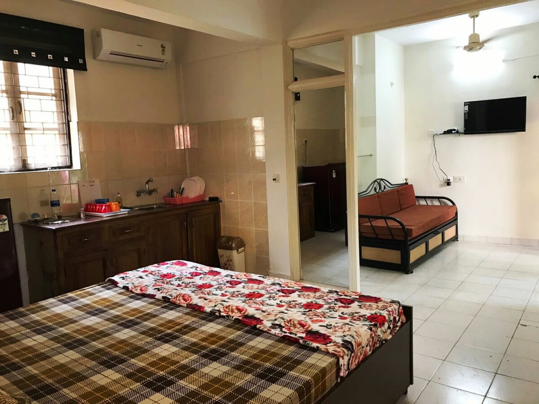Lovely 2 BHK Apartment | Kitchen & Pool - Tap to explore photos