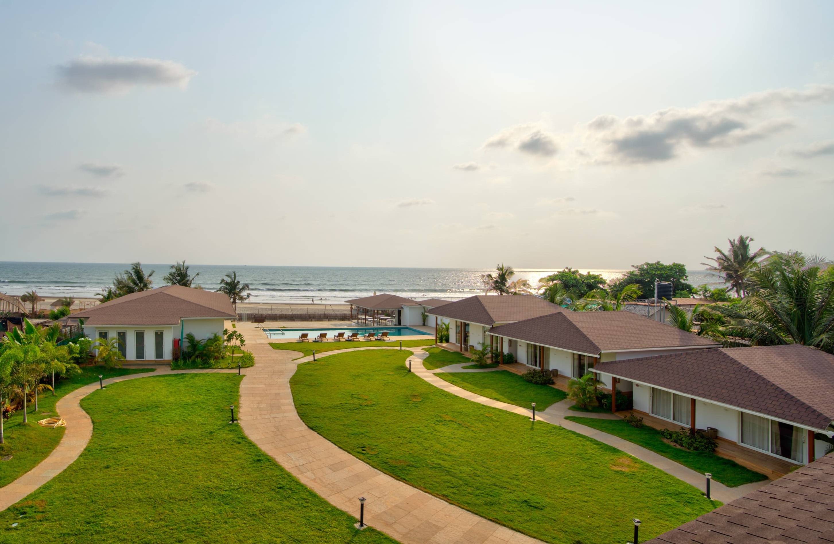 The Goa Beach Resort - Tap to explore photos
