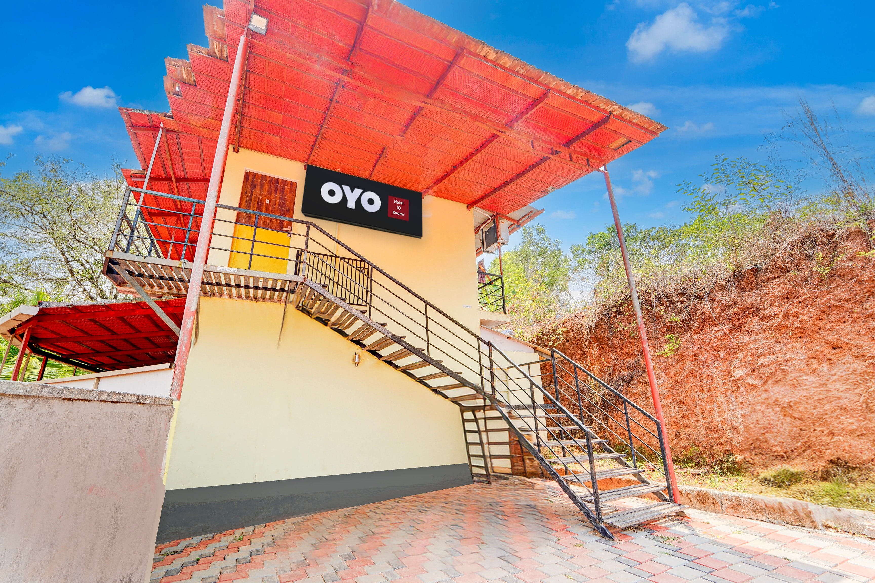 Hotel O IQ Rooms - Tap to explore photos