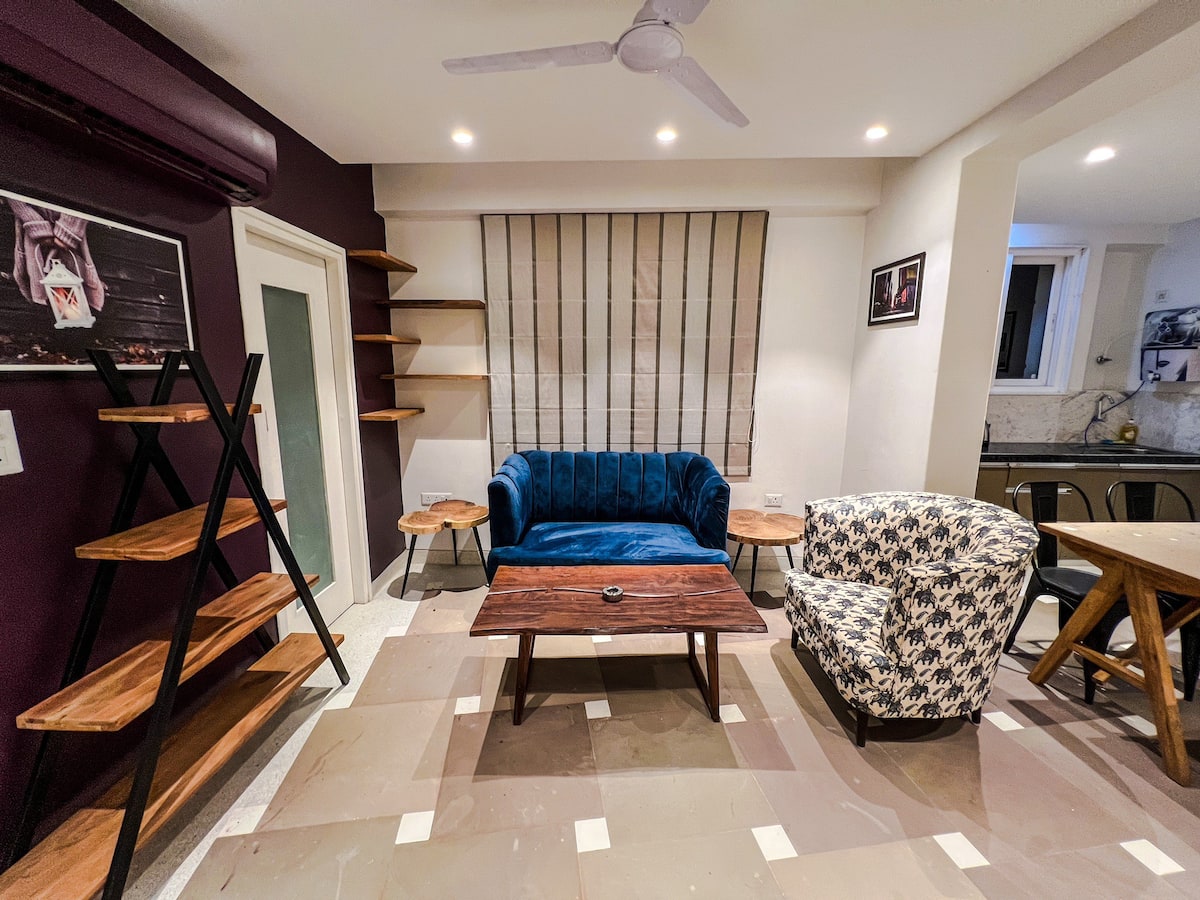 One Uptown 203 (modern 1 BHK loft) - Tap to explore photos