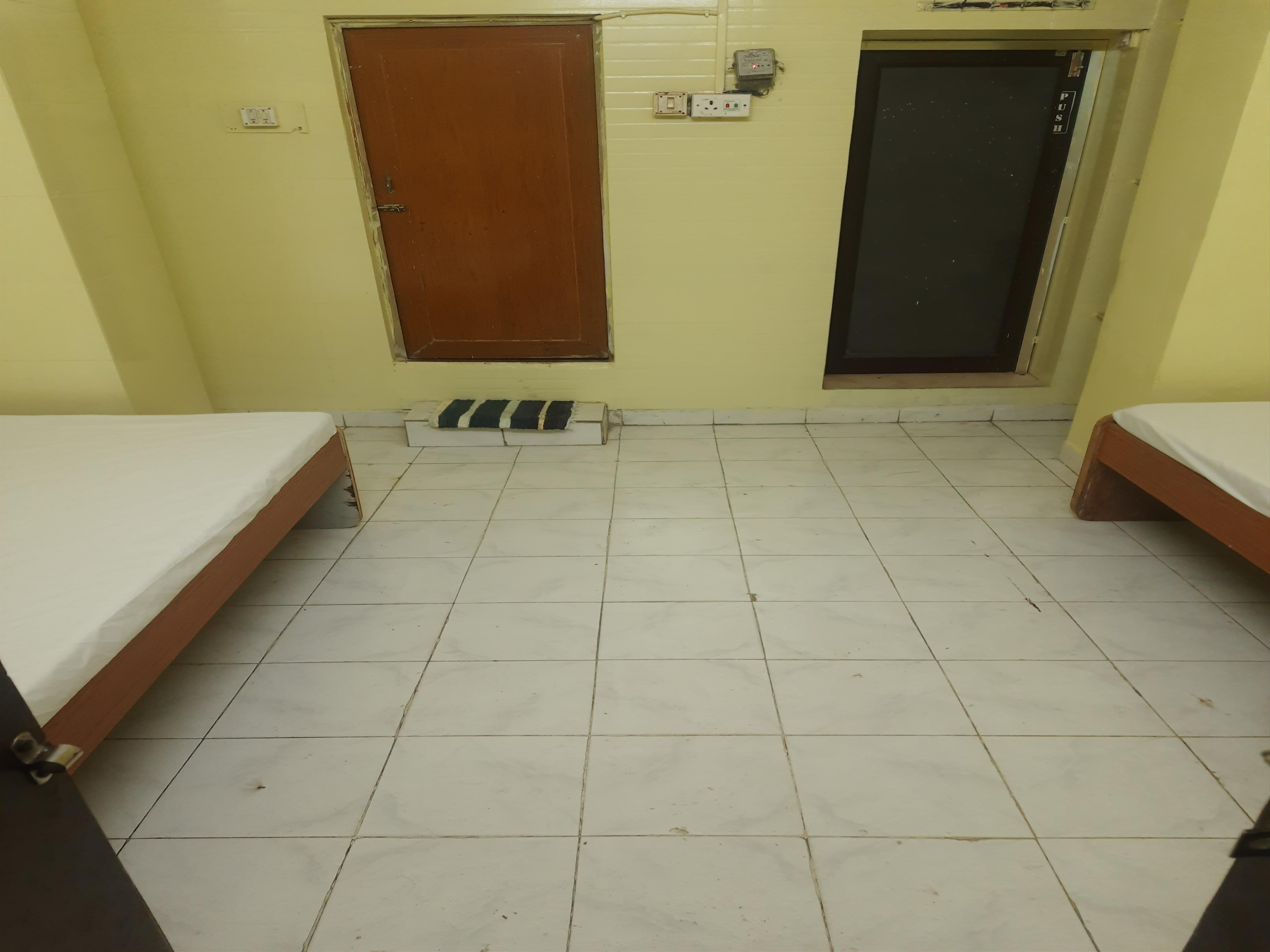 Jain guest house - Tap to explore photos