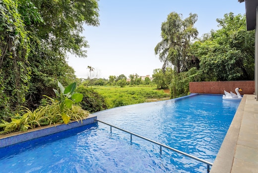 tisyastays | Gorgeous 1BHK Apartment with Infinity Pool, 5mins to beach