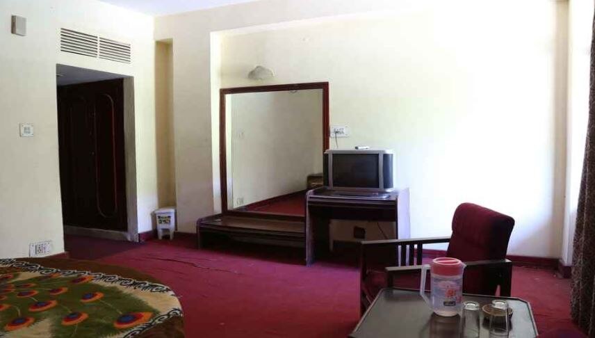 Hotel Mahadev - Tap to explore photos