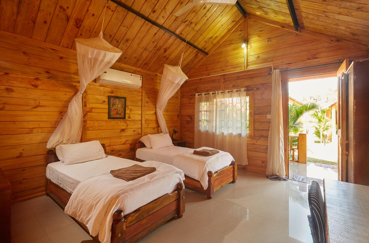 Saxony Garden Resort | Rooms with Caretaker - Tap to explore photos