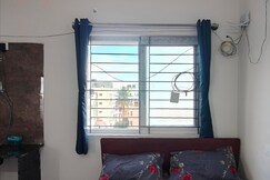 Compact BTM Layout Apartment by ANI living Spaces, Bangalore