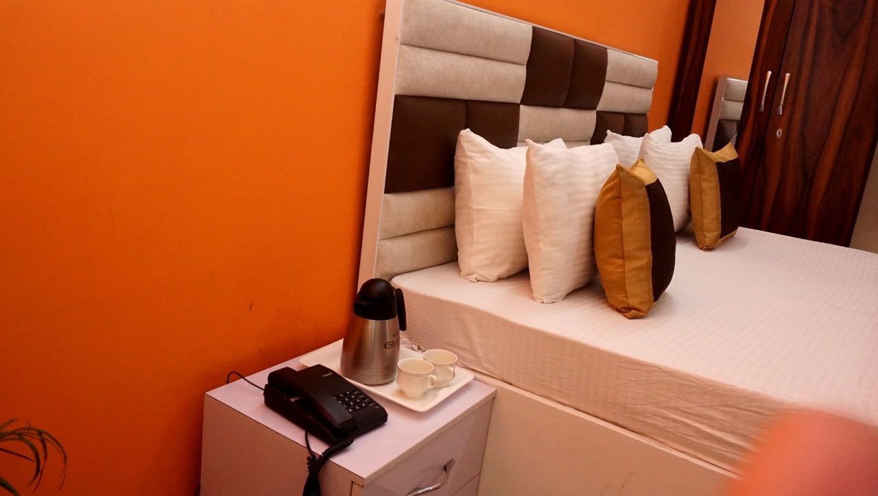 Hotel O Home Happy Homestay - Tap to explore photos