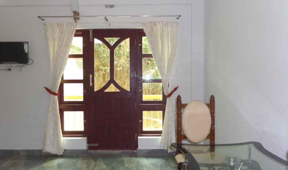 Kulangara Cottage Family Room - Tap to explore photos