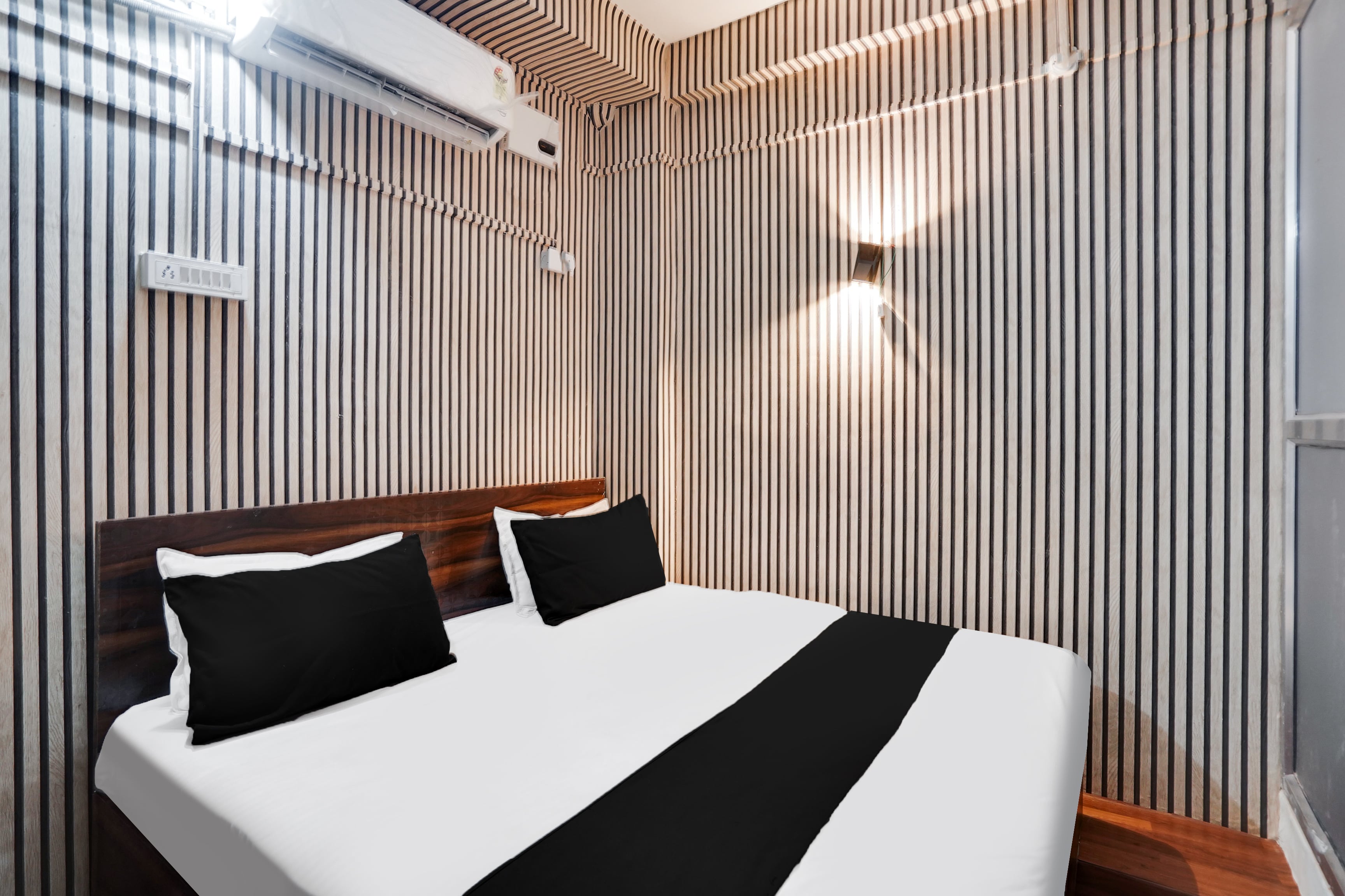 Hotel O Pushpak Rooms - Tap to explore photos