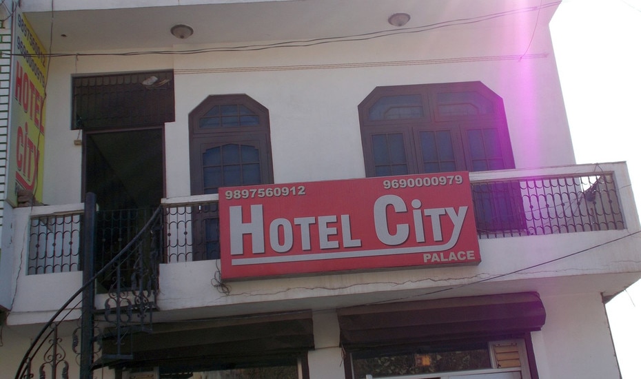 Hotel City Palace  - Tap to explore photos