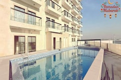 Luxury Apartment with Pool Gym & Free Parking at Equiti Gates Jebel Ali, Dubai