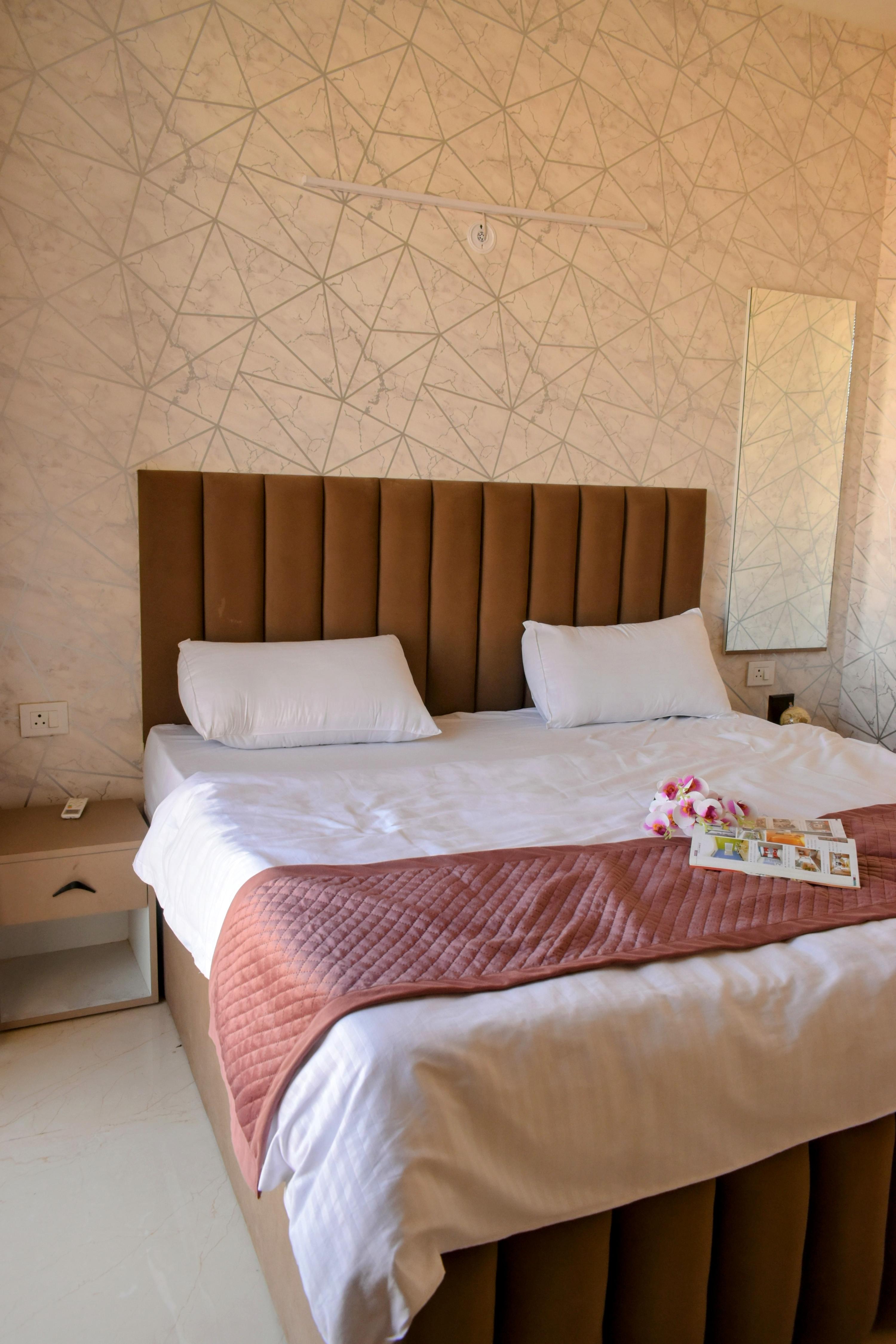 Kunj Retreat  1 BHK in Chandrodaya Mandir Campus - Tap to explore photos