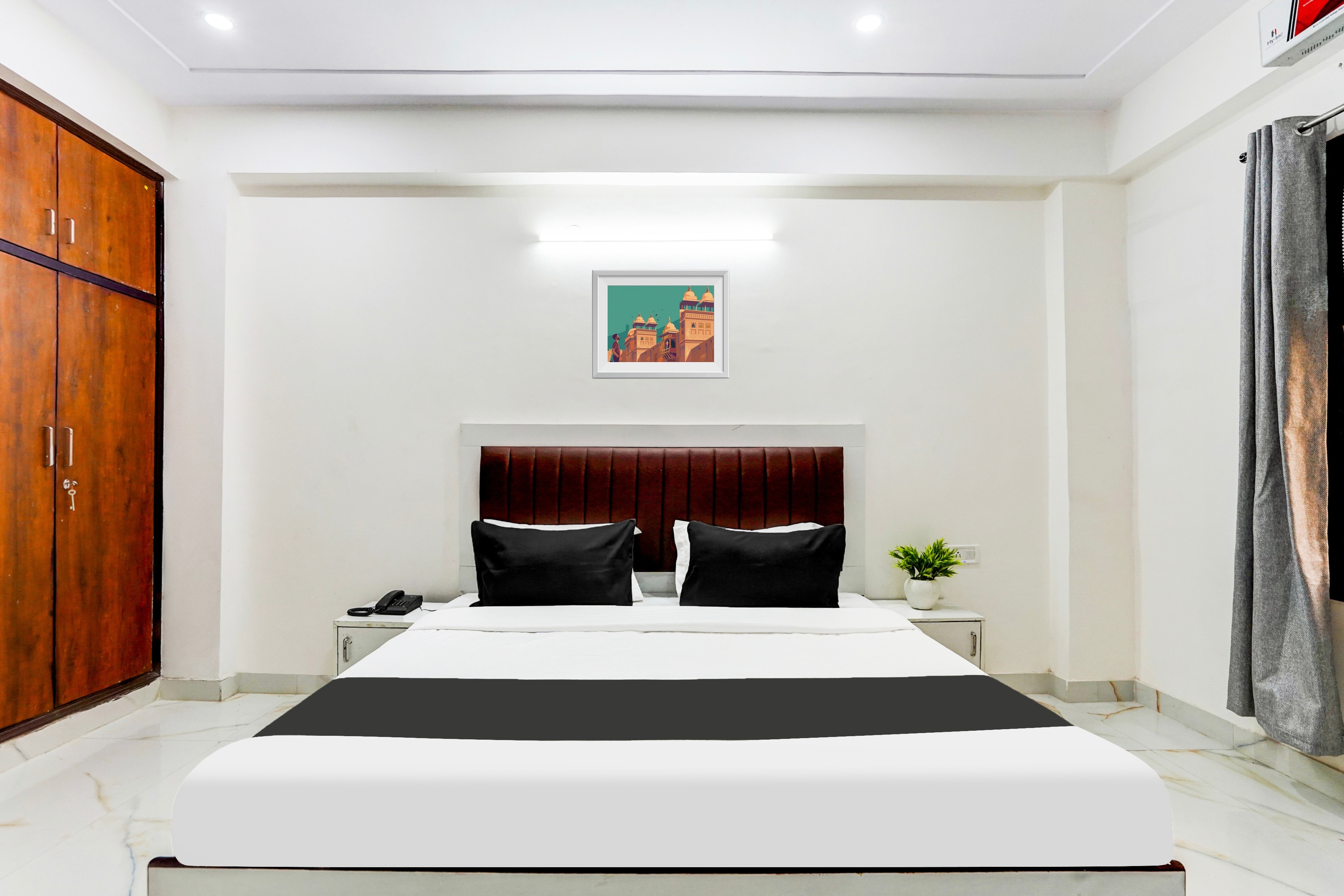 Hotel O Premium Rooms - Tap to explore photos