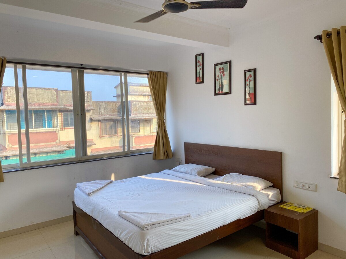 E2 - Maroon by Nirvana Abode - 1BHK - North Goa - Tap to explore photos