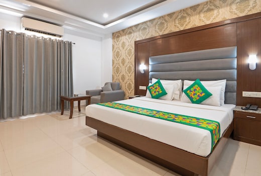 Treebo Grand Legacy Elite With Roof Top Cafe