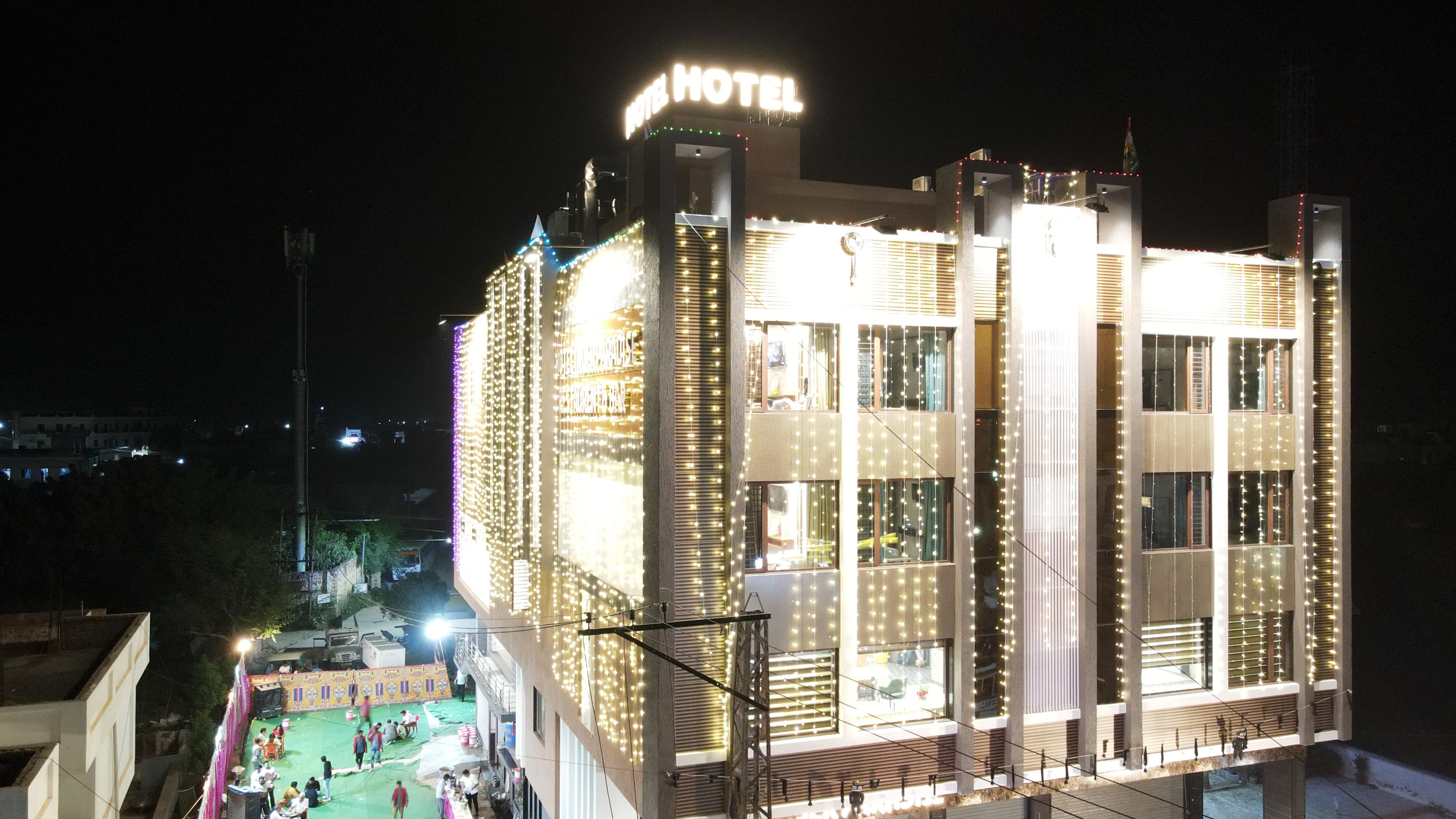 hotel inder paradise - Tap to explore photos