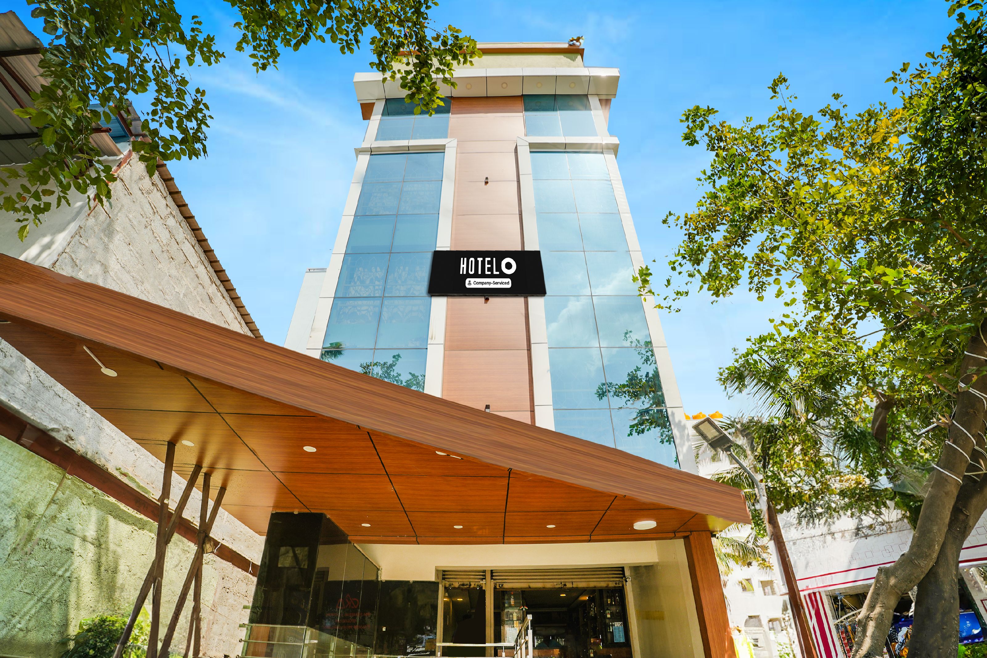 Super Hotel O Bangalore Near Reva Circle Formerly CKA Boarding - Tap to explore photos