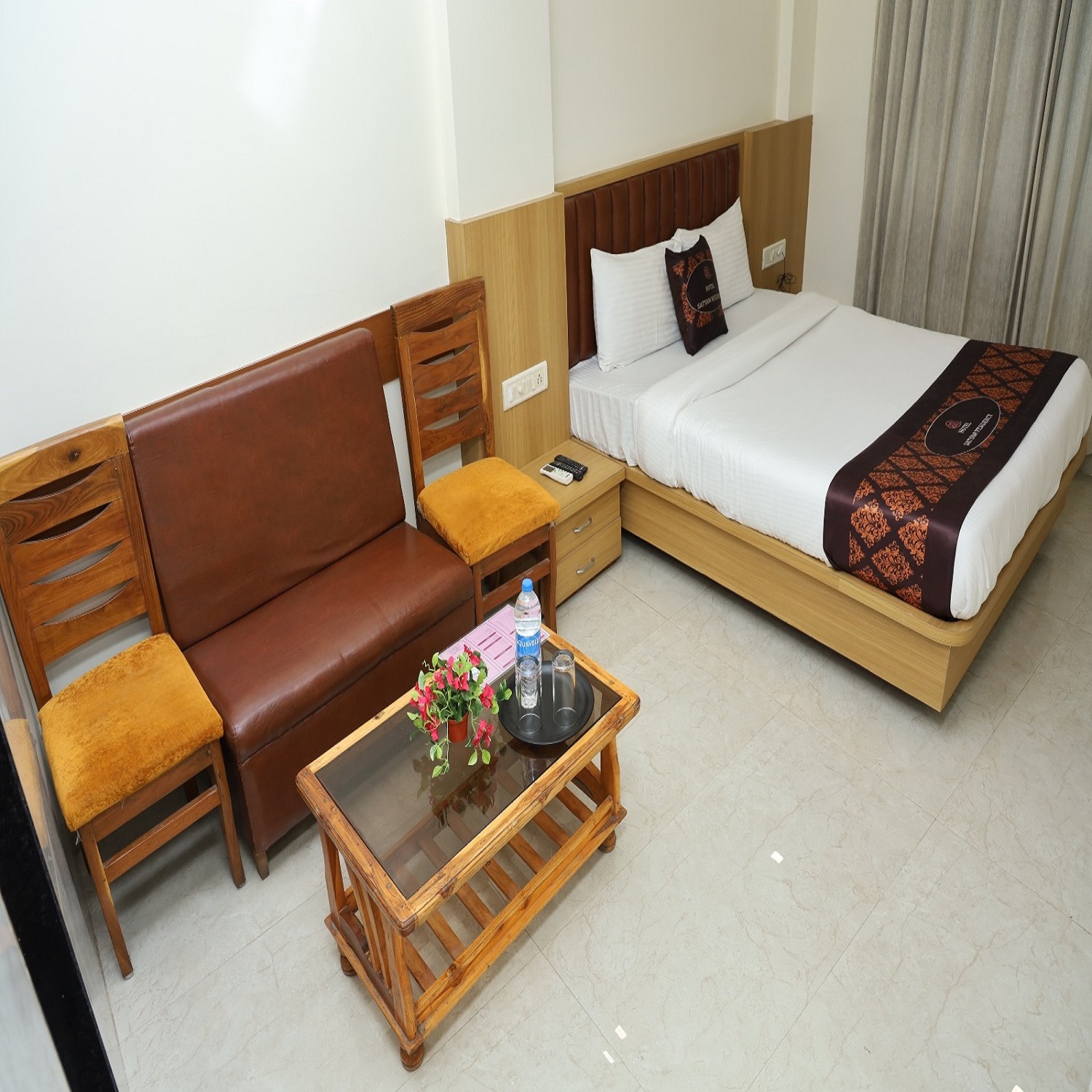 Hotel Satyam Residency - Tap to explore photos