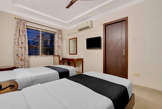 Capital O Elegant Amethyst Business Hotel Near Ragigudda Sri Prasanna Anjaneyaswamy Temple