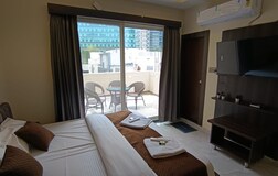 Deluxe AC Room with Balcony Sit-out